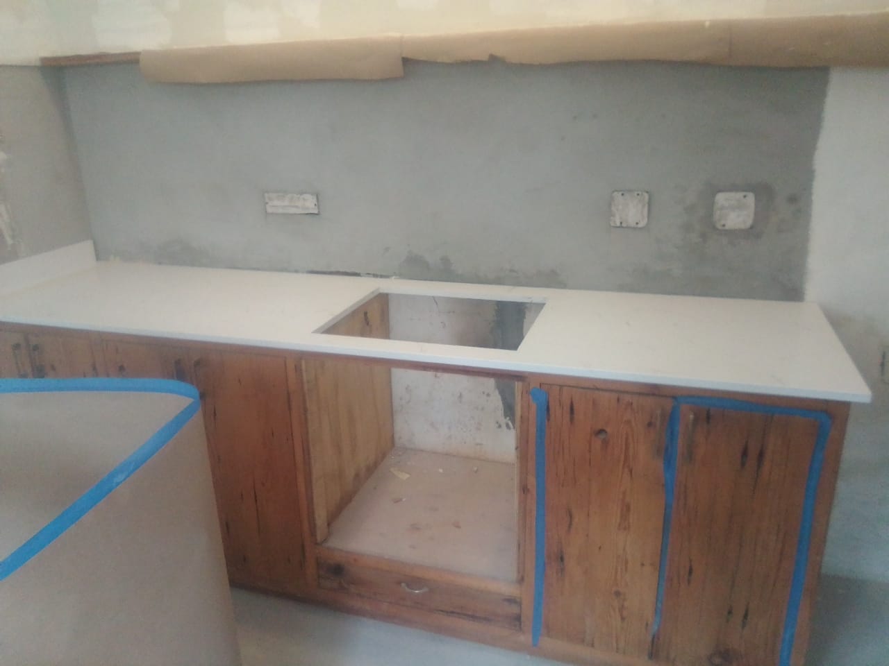 New counter and cupboard layout with an opening for a sink during installation